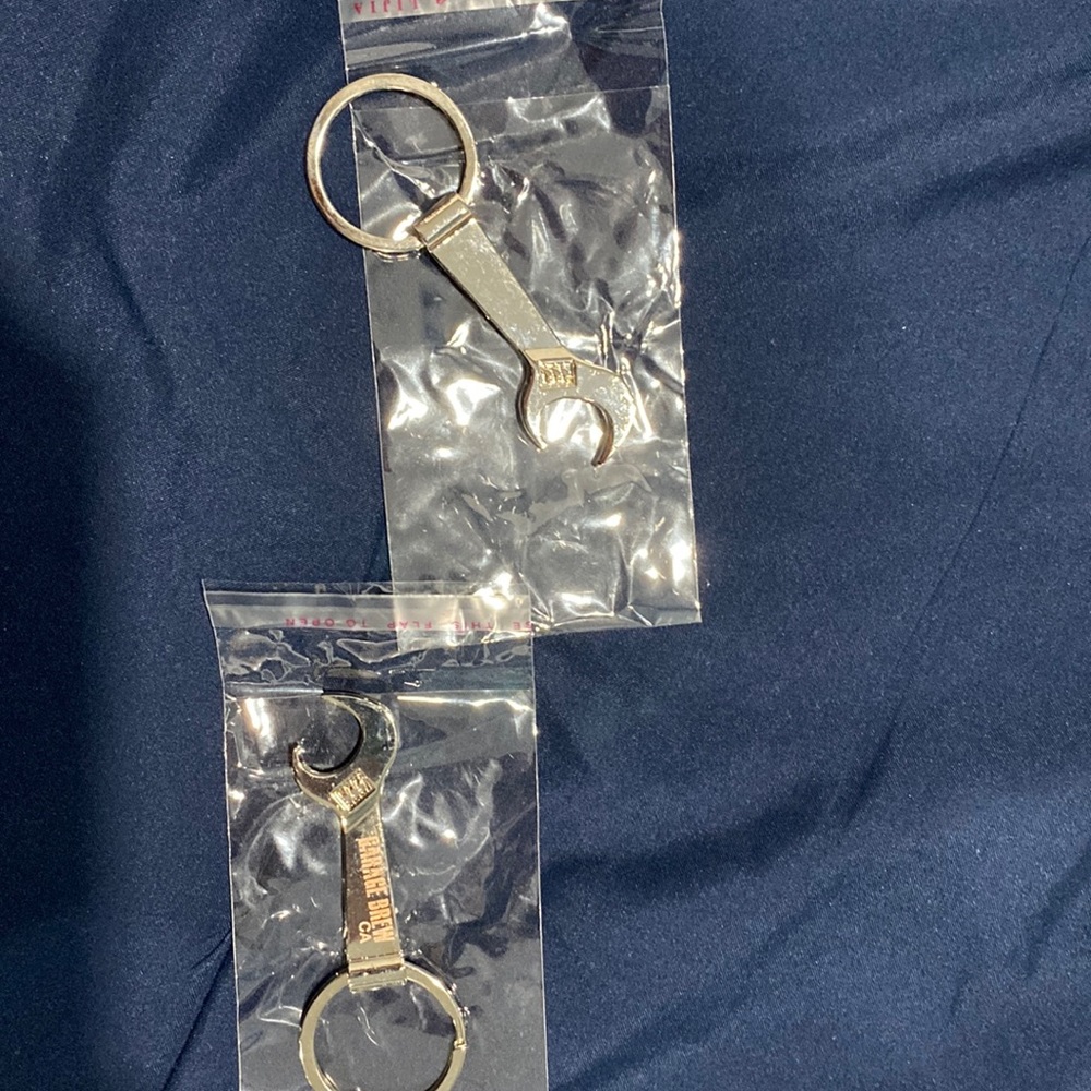 Wrench bottle openers